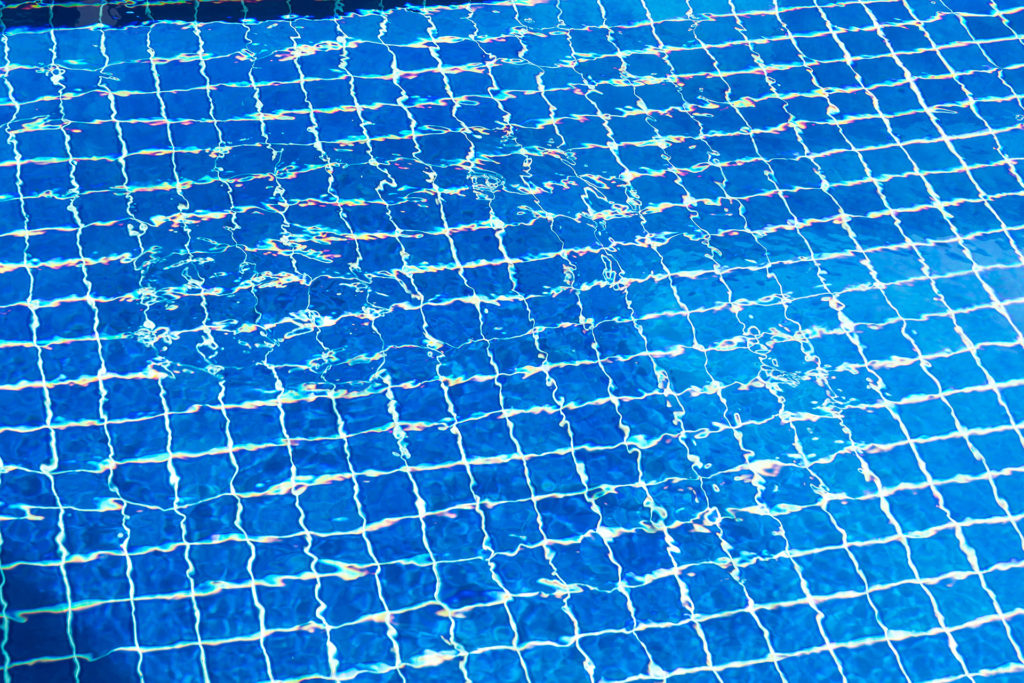 Blue ripped water in swimming pool